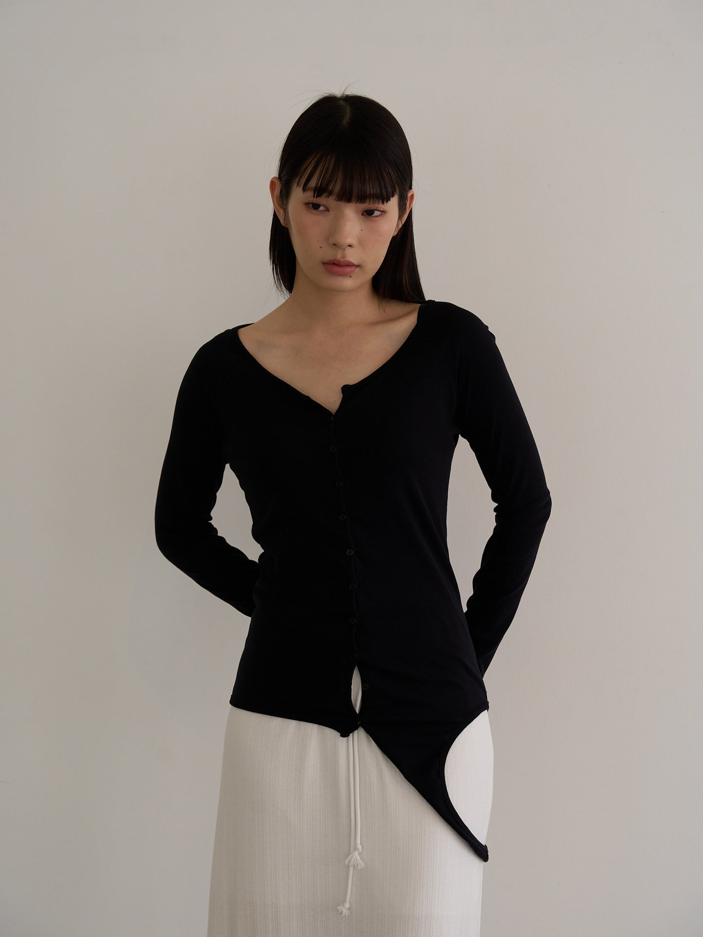 curved hem button top