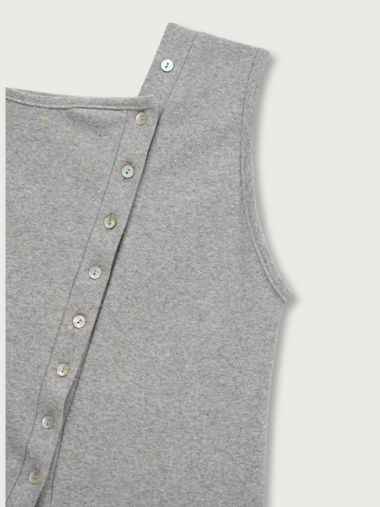 asymmetric button top