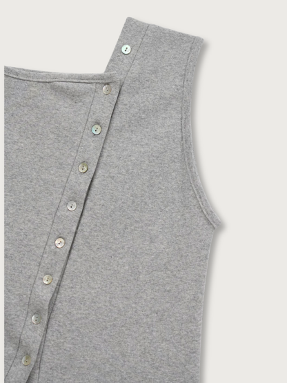asymmetric button top