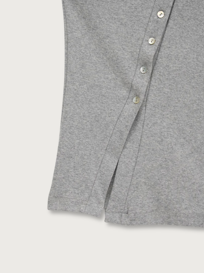 asymmetric button top