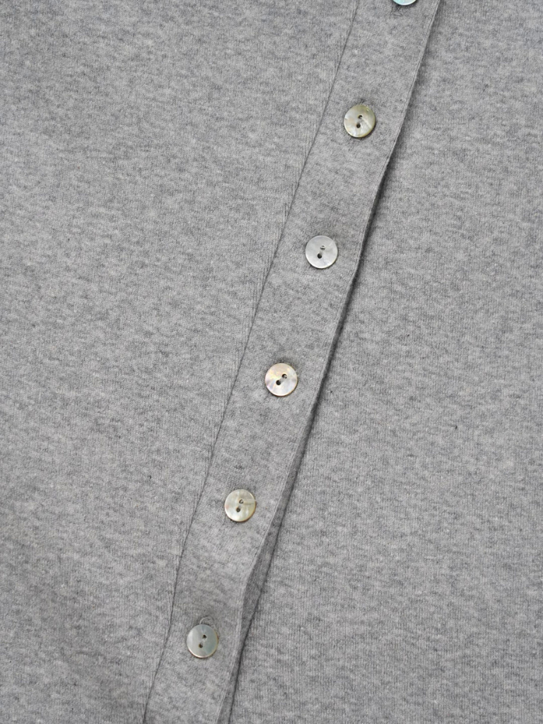 asymmetric button top