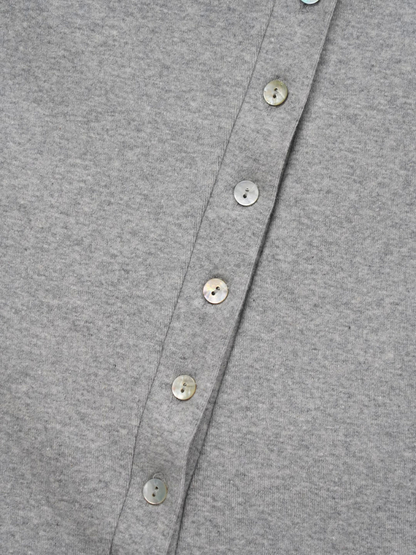 asymmetric button top