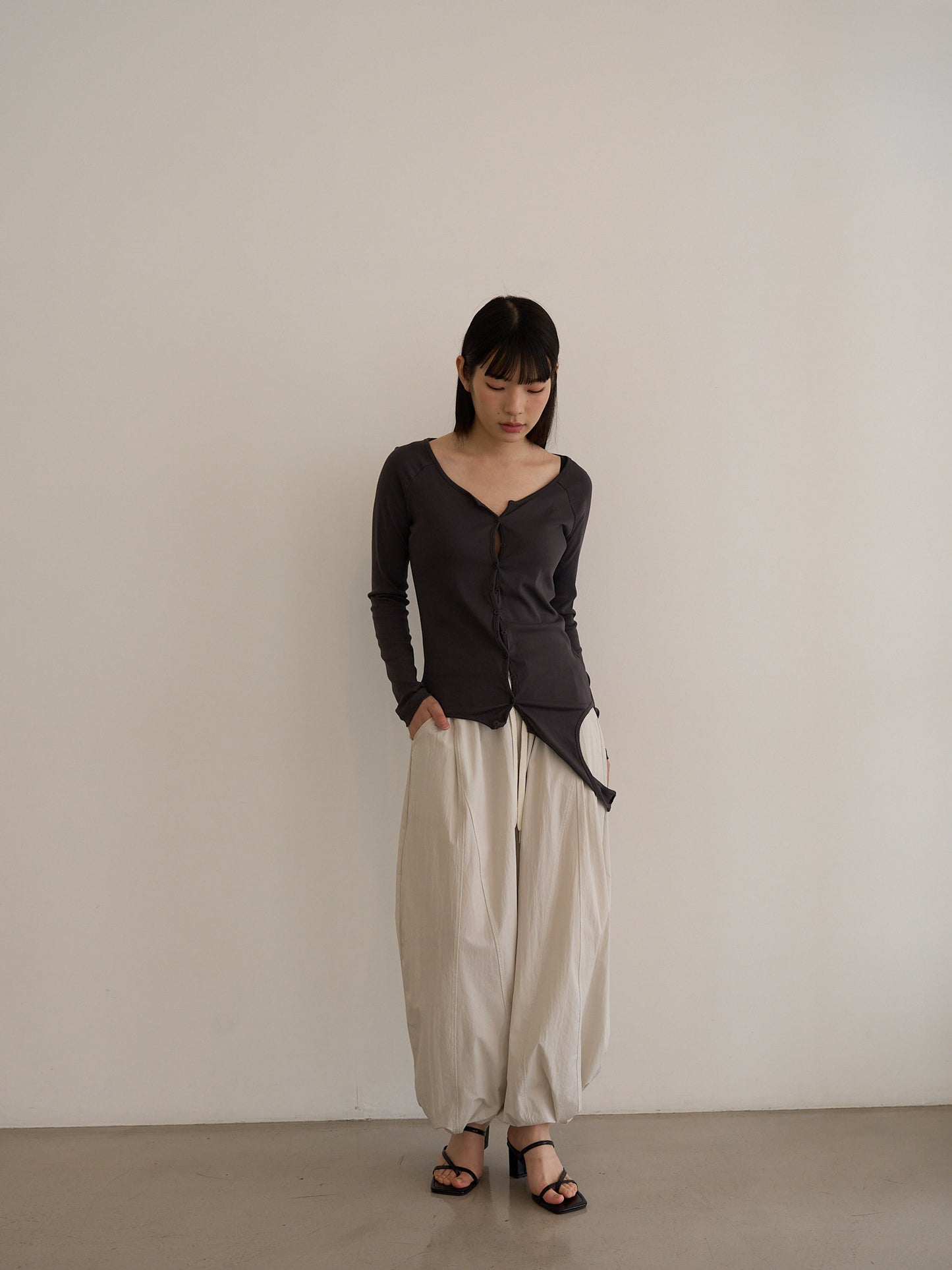 curved hem button top