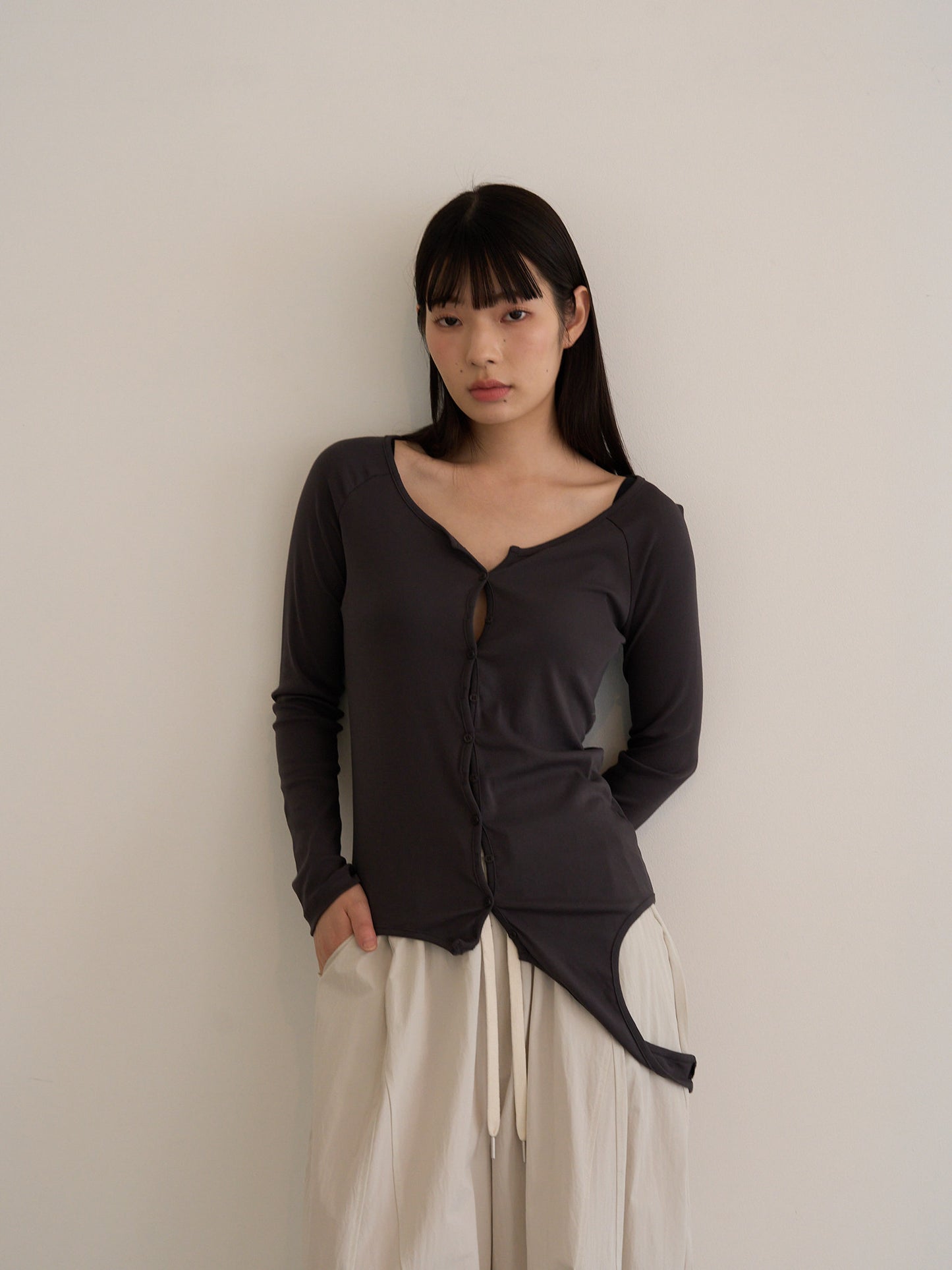 curved hem button top