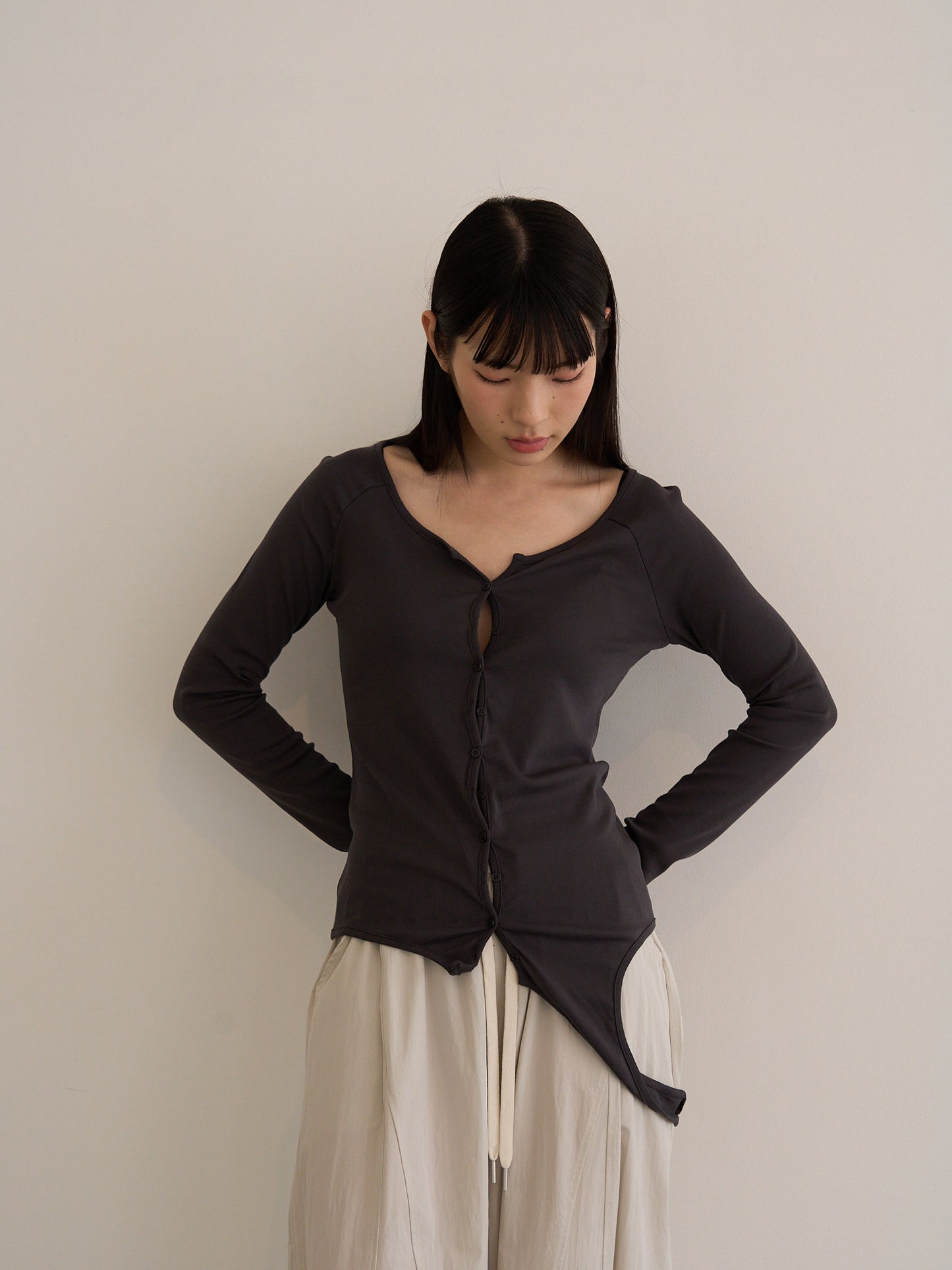 curved hem button top