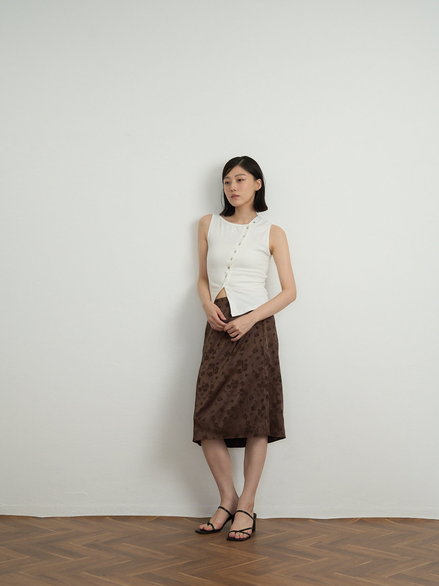 asymmetric button top