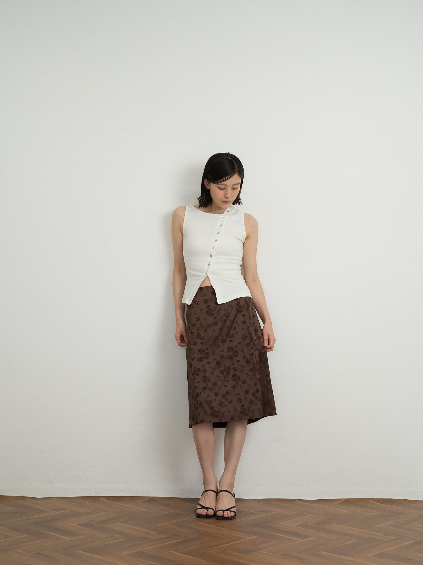 asymmetric button top
