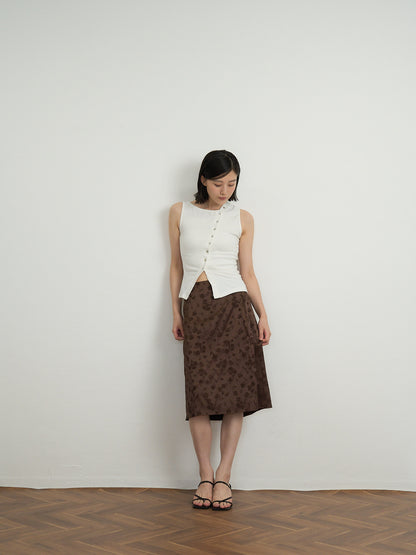 asymmetric button top