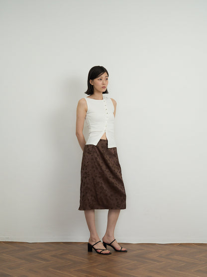 asymmetric button top