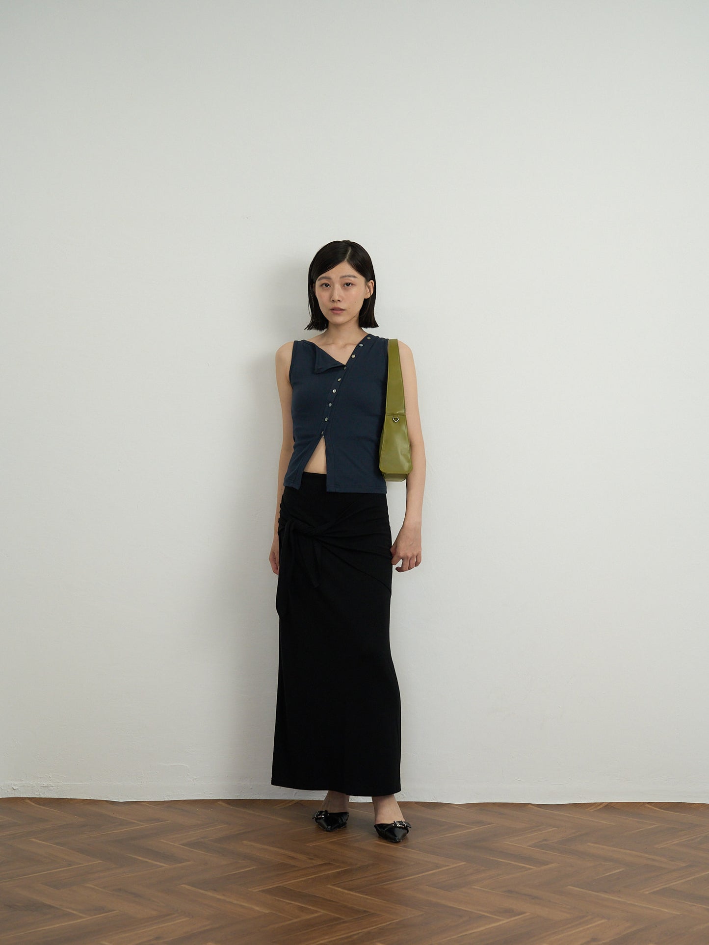 asymmetric button top