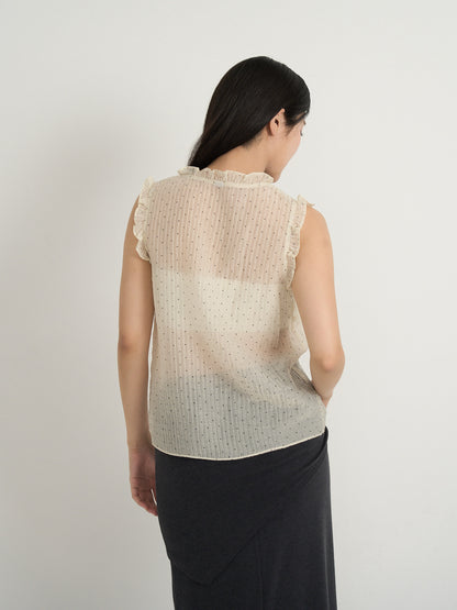 dot sleeveless blouse